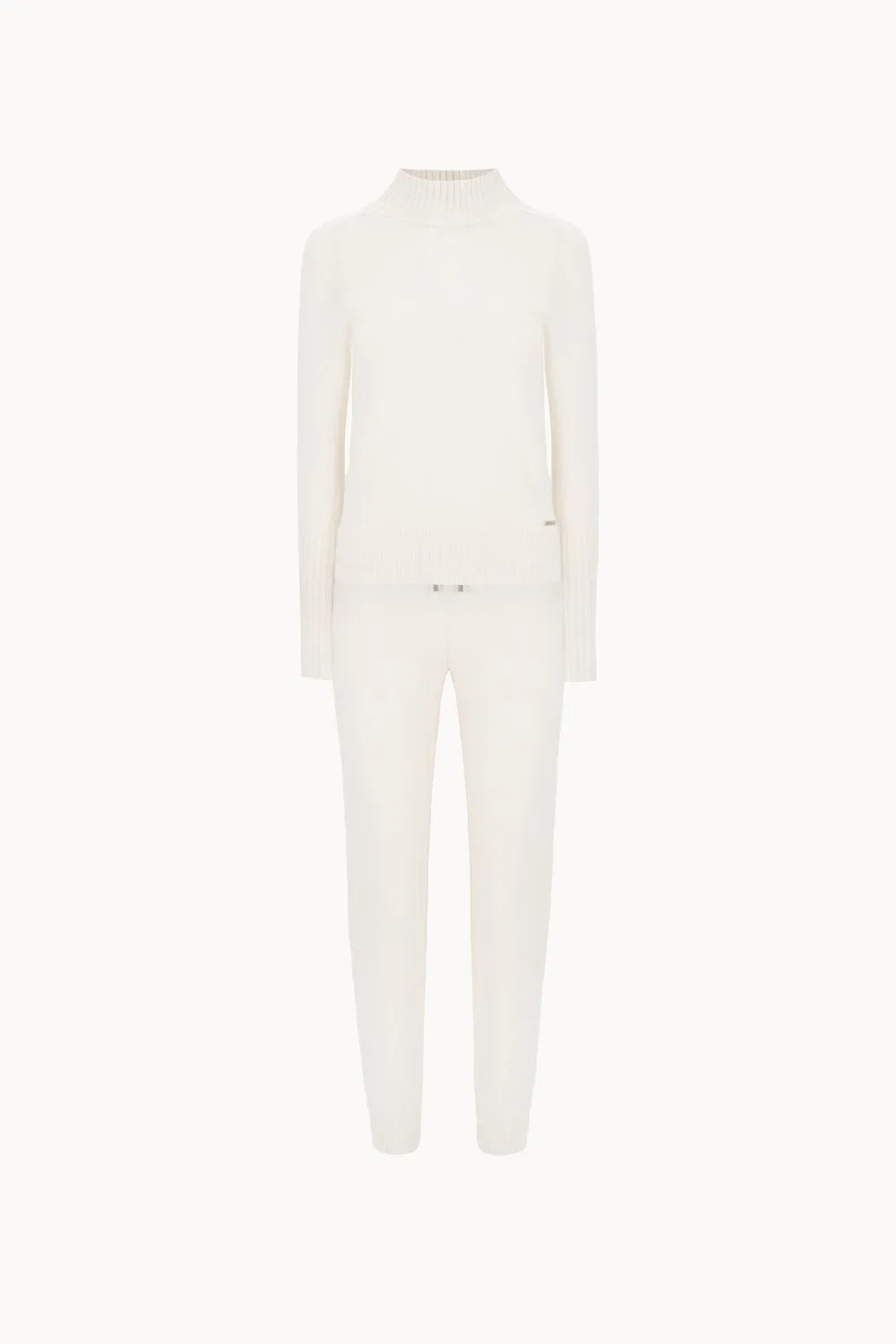 Suit: sweater with cuffs and pants with drawstring...